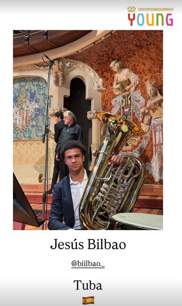 man holding a tuba
